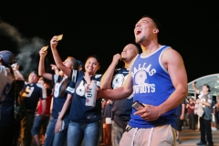 Tomas Acosta, right, from Dallas, reacts to Dallas Cowboys' picking Byron Jones for the NFL Draft Pick during the Cowboys draft party at AT&T Stadium in Arlington, TX on April 30, 2015. (Kye R. Lee/The Dallas Morning News)