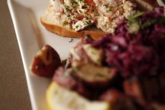 New England Style Lobster Roll with Asian Slaw and Grilled Potato Salad at the Sea Breeze Fish Market and Grill in Plano, TX on March 14, 2012. ( Kye R. Lee / The Dallas Morning News )