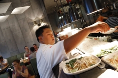 Chef Eddy Thretipthuangsin checks each dishe before serving to customer at Pakpao on August 28, 2013.  (Kye R. Lee/The Dallas Morning News)