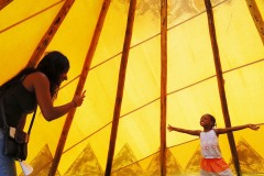 April Little, left, of Plano, photographs her five-year-old daughter Kaycee inside of an indian tipi during Farm-O-Ree at Heritage Farmstead Museum Plano, TX on September 7, 2014. Farm-O-Ree is a free fun day on the farm which is hosted by The Boy Scouts of America, Girl Scouts of Northeast Texas and the YMCA. (Kye R. Lee/The Dallas Morning News)